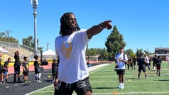 Najee Harris gives back at his former HS